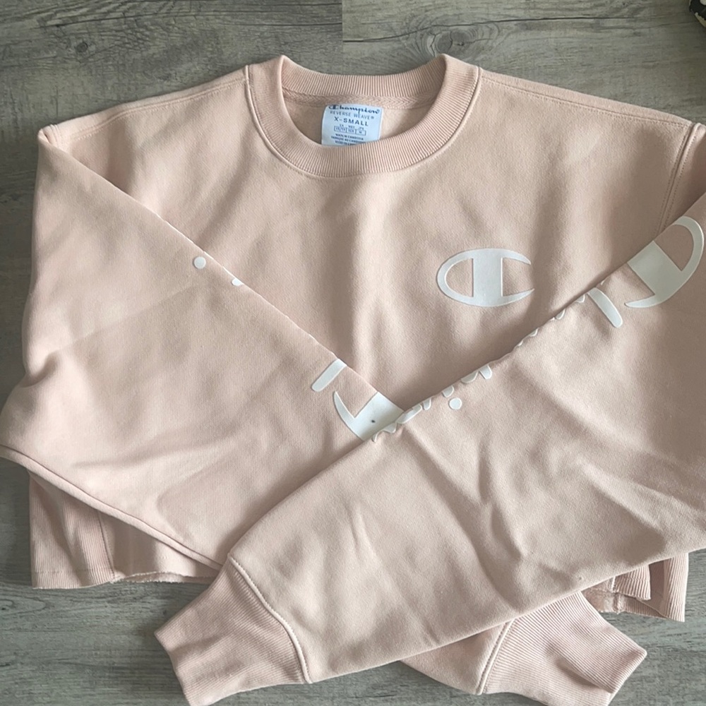 Light pink cropped Champion sweater size as